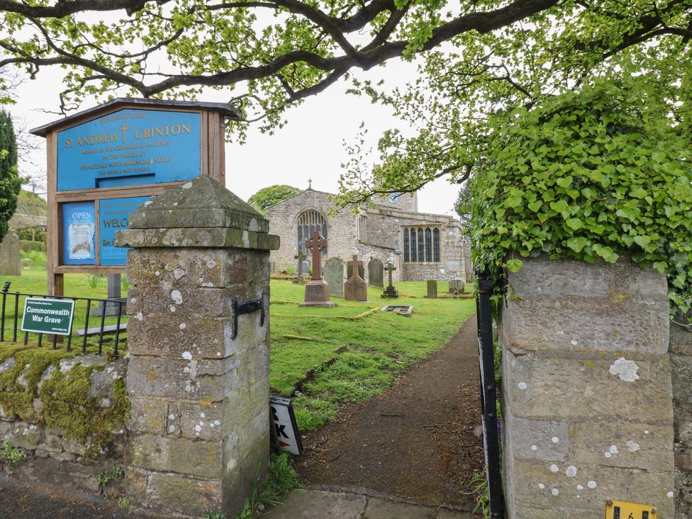 A church and cemetery entrance at St Andrew Grinton in Reeth