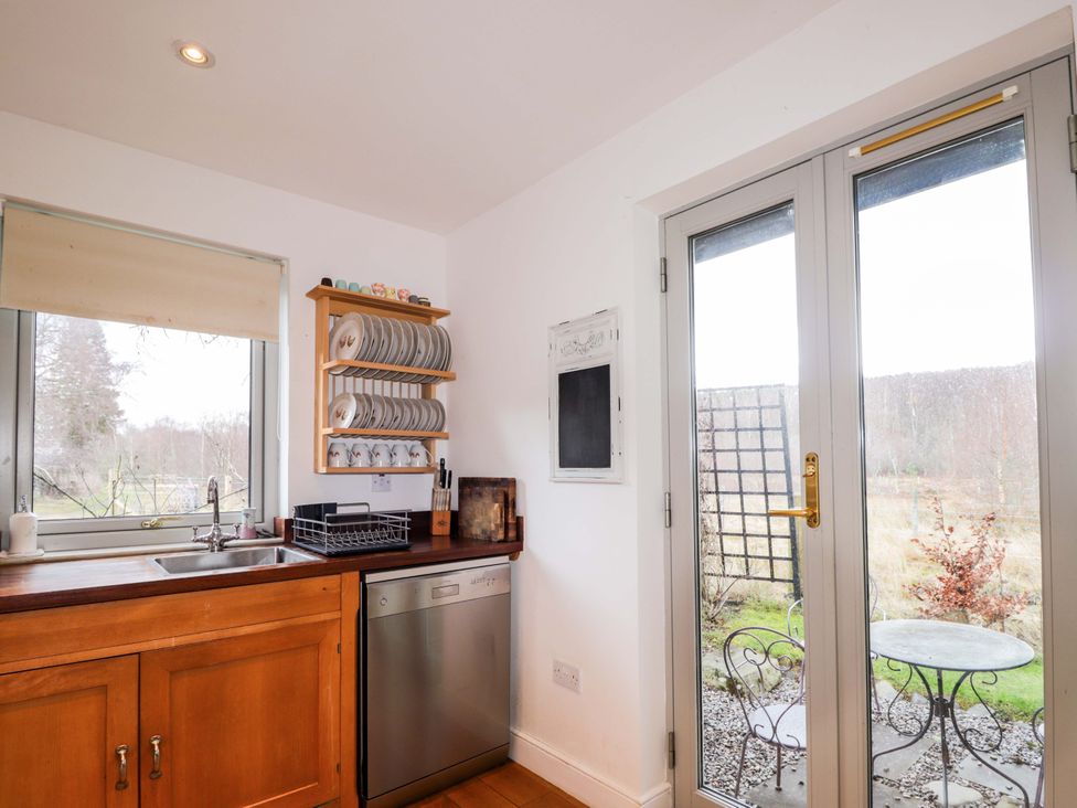 A kitchen with a sink and dishwasher at Inshcraig Kincraig near Aviemore