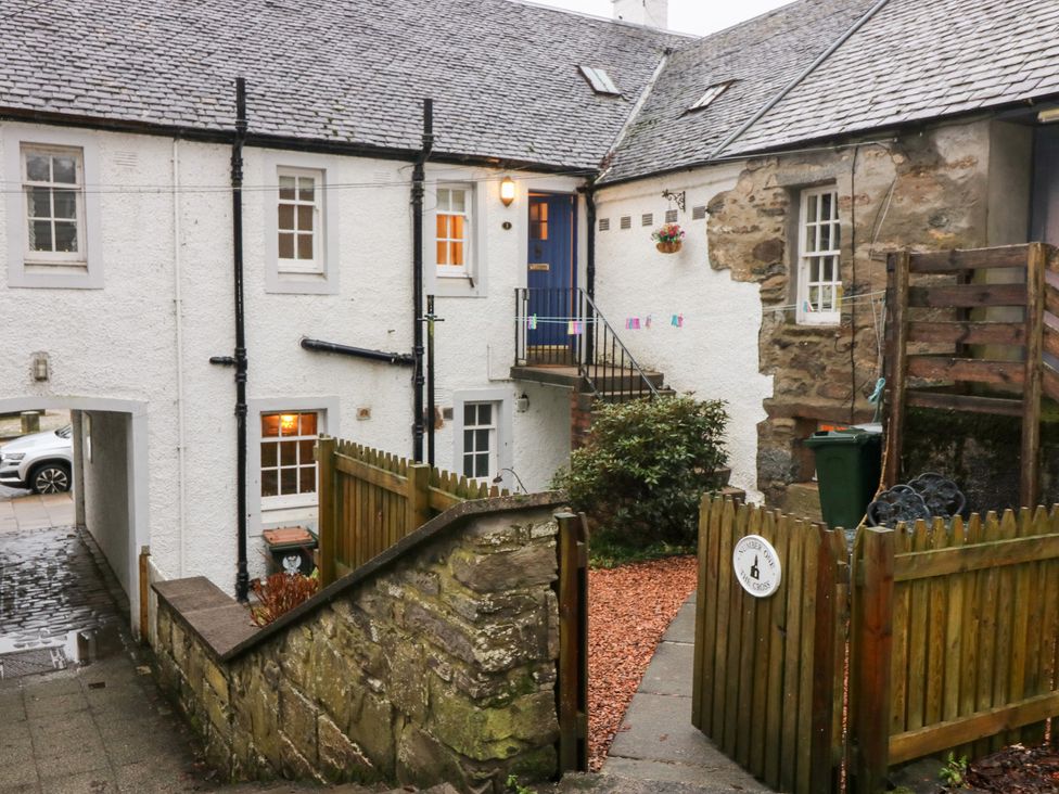 An outdoor area with buildings and a pathway at 1 The Cross, Dunkeld