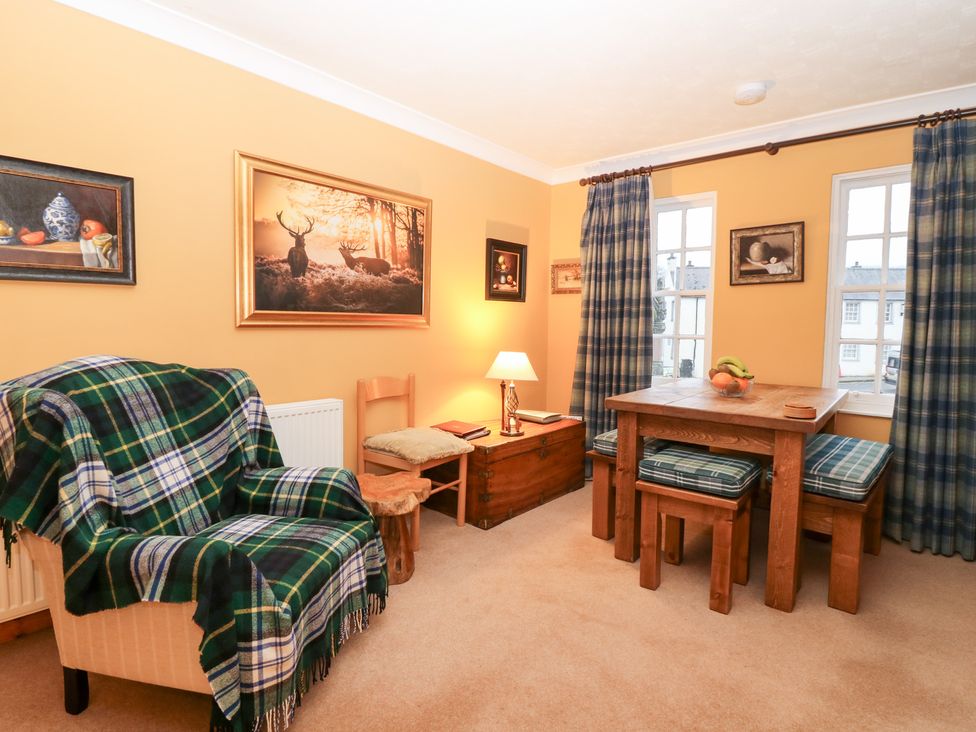 A snug with a table and chairs at 1 The Cross, Dunkeld