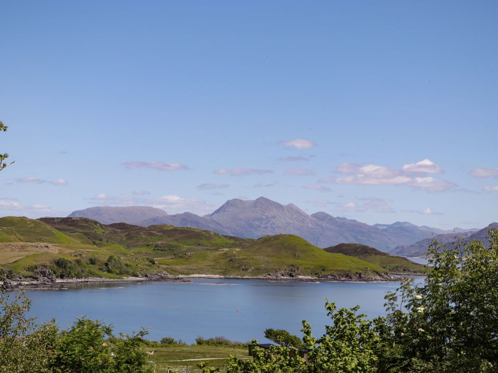 A scenic view of mountains and water at The Lookout in Saasaig near Broadford