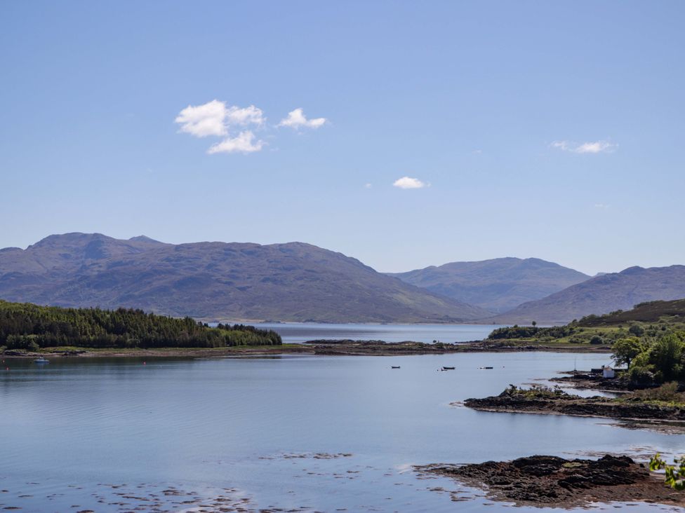 A landscape view of water and mountains at The Lookout Saasaig near Broadford