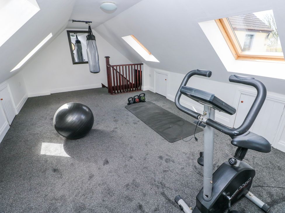 A gym with exercise equipment at Mountain Farm in Broad Haven