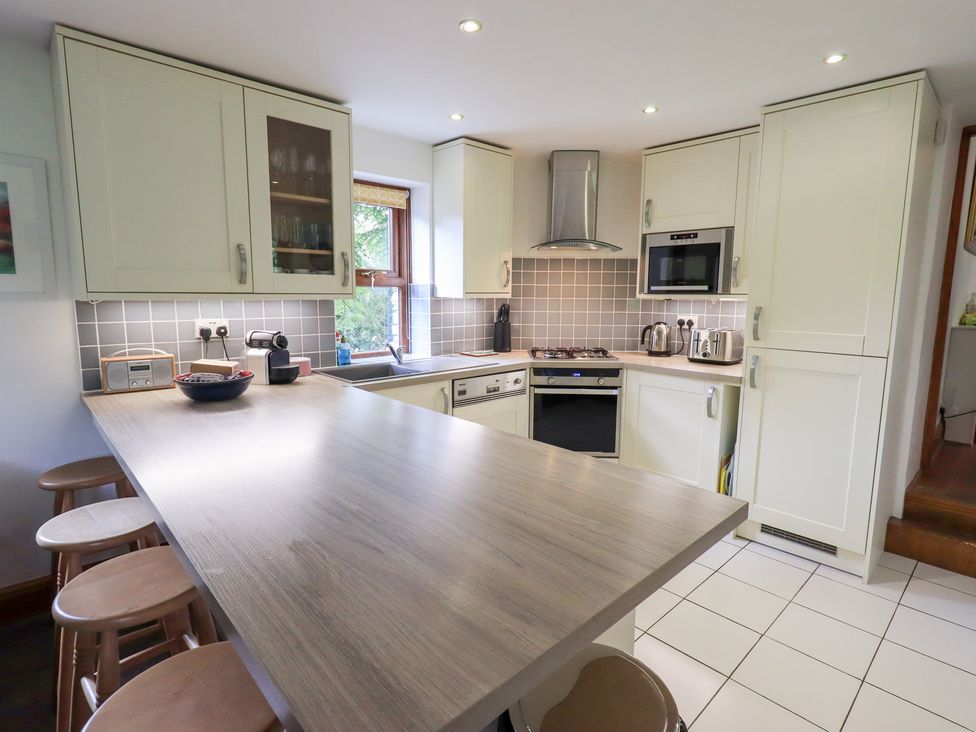 A kitchen with cabinets and countertop at Drystones in Grasmere