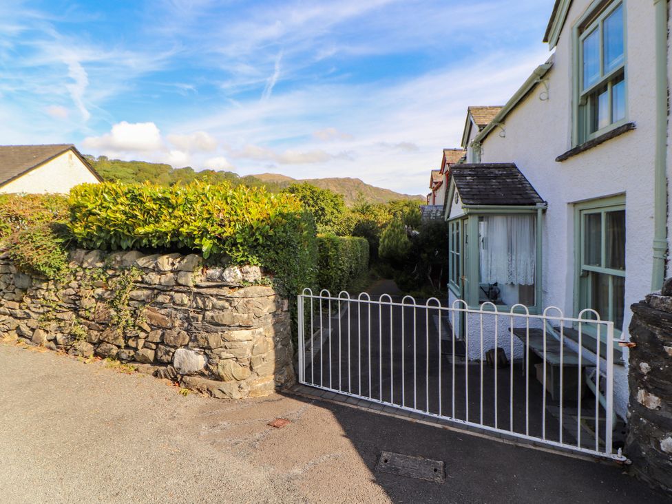 A house with a gate and path at Sunbeam Cottage in Coniston