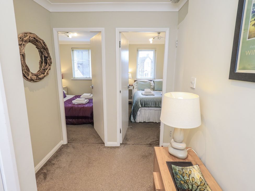 A hallway with bedrooms on either side at Lakeland Loft Windermere