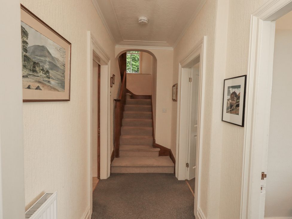 A hallway with stairs leading up at Miyanli in Bowness