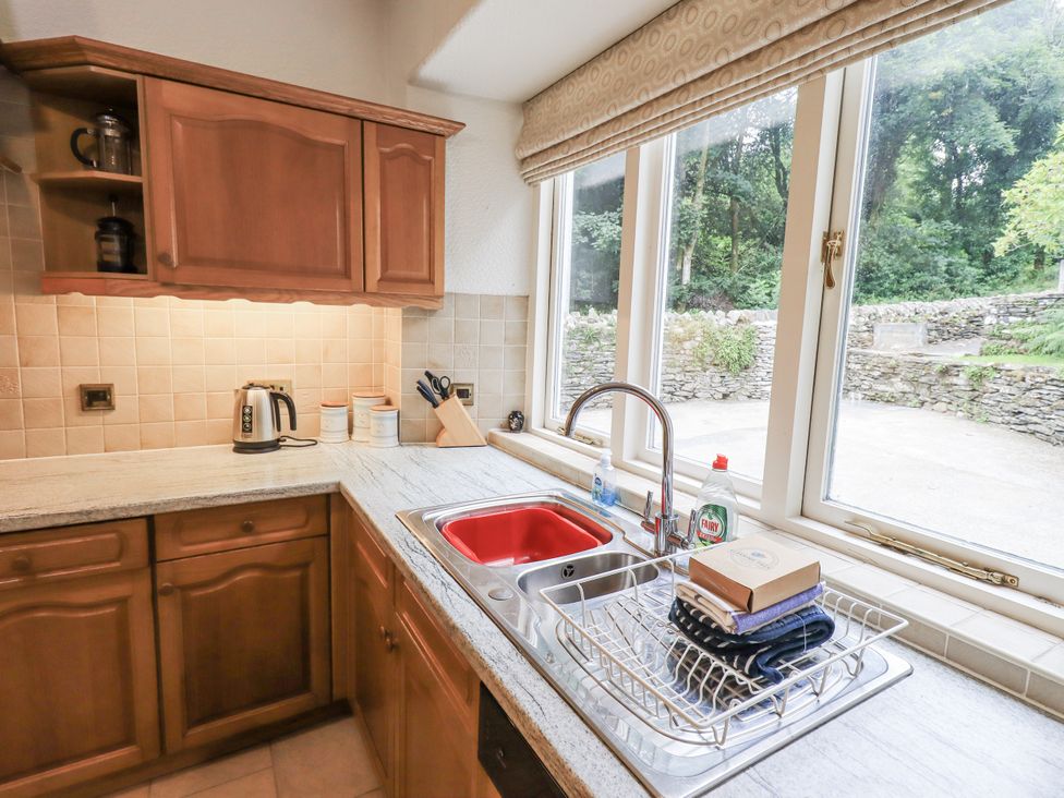 A kitchen with a sink and kettle at Miyanli in Bowness