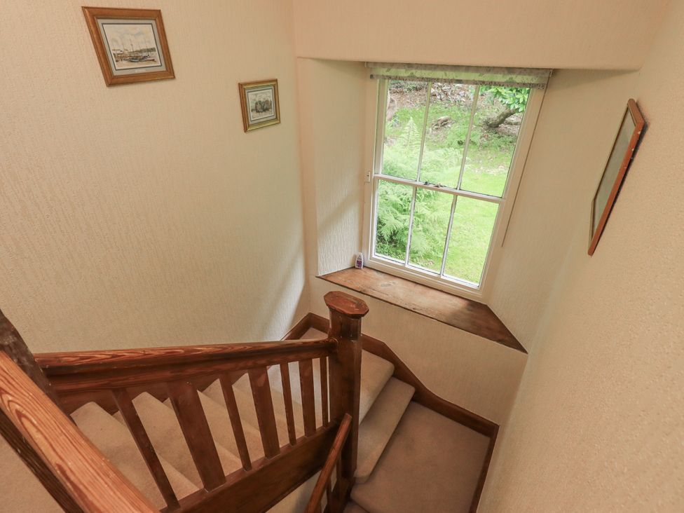 A stairway with a window at Miyanli in Bowness
