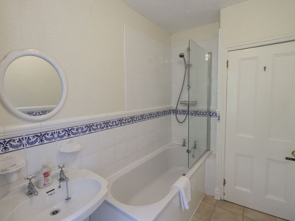 A bathroom with a bathtub and shower at Miyanli in Bowness