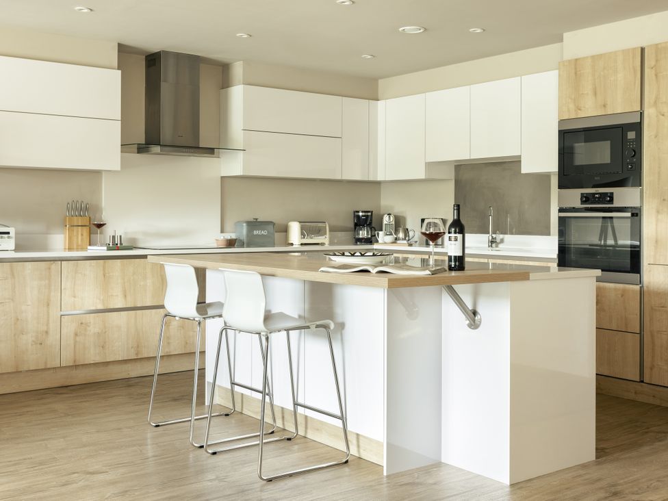 A kitchen with appliances on the counter at Take Five in Ambleside