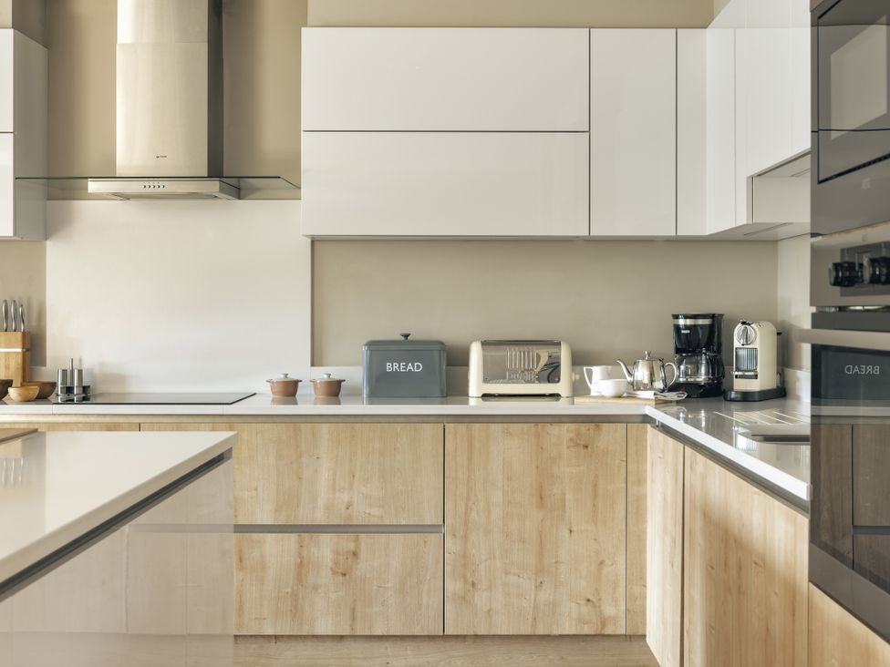 A kitchen with a toaster and coffee maker at Take Five in Ambleside