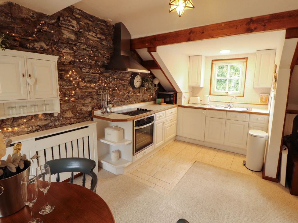 A kitchen with a window and appliances at High Raise in Grasmere