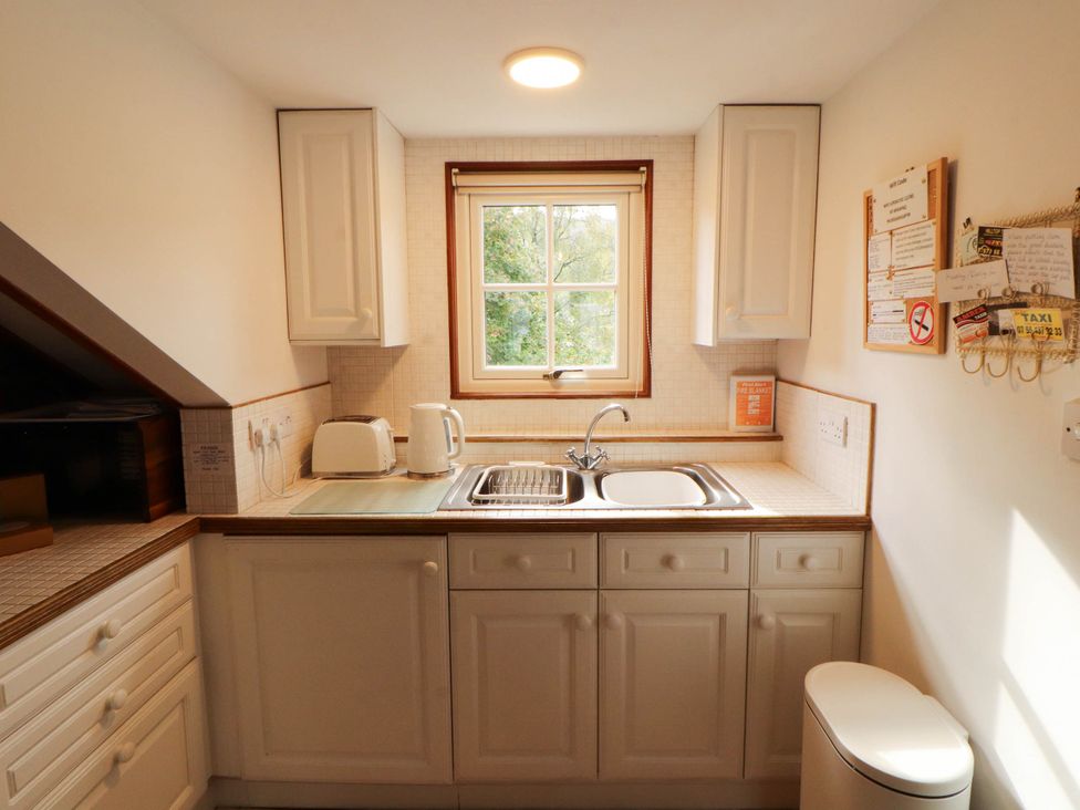 A kitchen with a sink and kettle at High Raise in Grasmere
