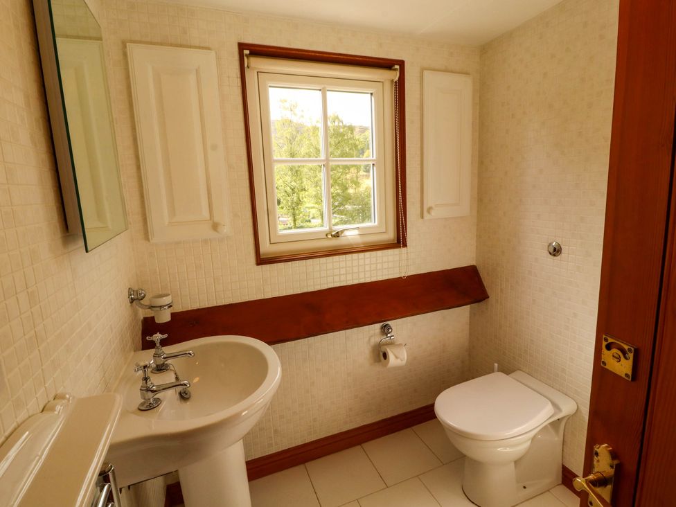 A bathroom with a sink and toilet at High Raise in Grasmere