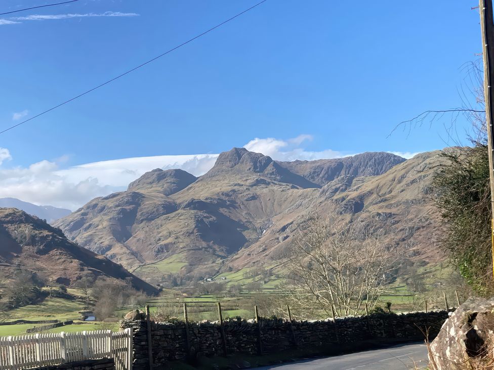 A view of mountains and blue sky at Beck Steps Chapel Stile