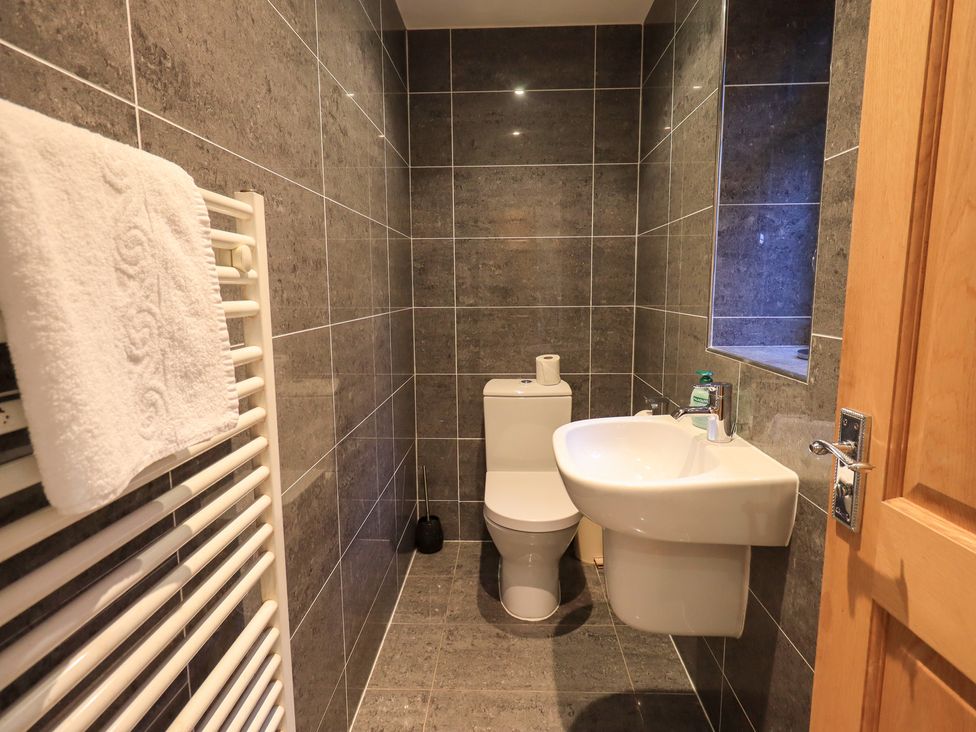 A bathroom with a sink and toilet at Fairfield Cottage in Grasmere