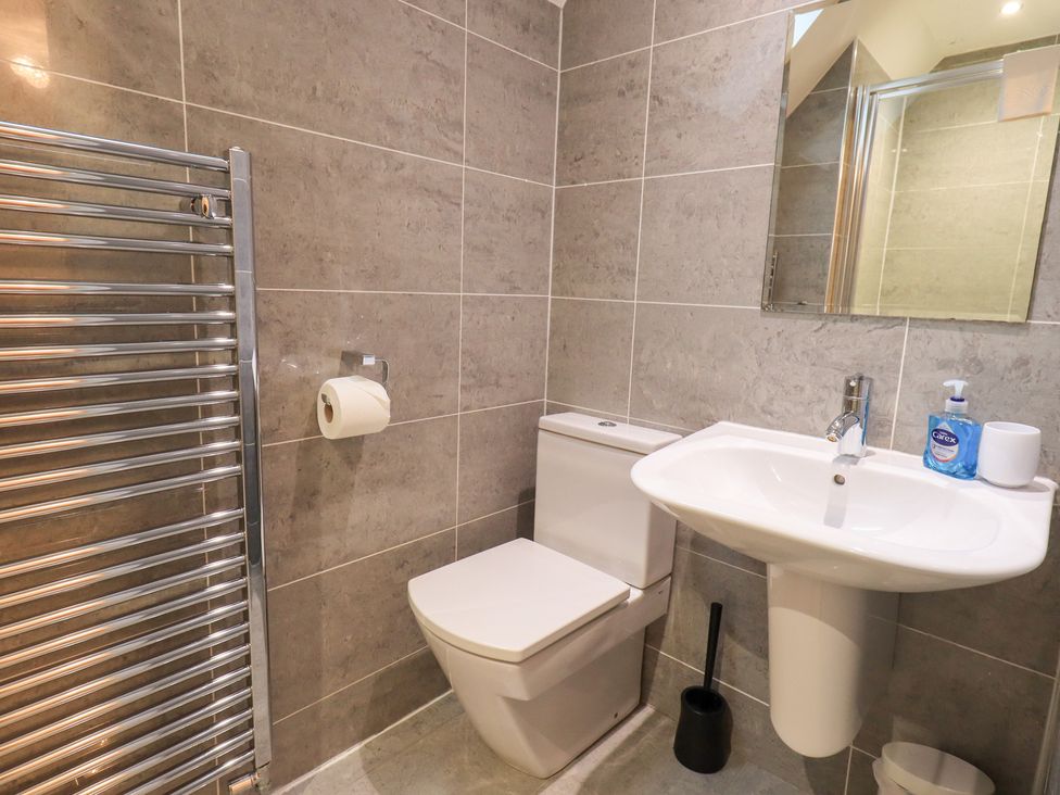 A bathroom with a sink and toilet at Fairfield Cottage in Grasmere