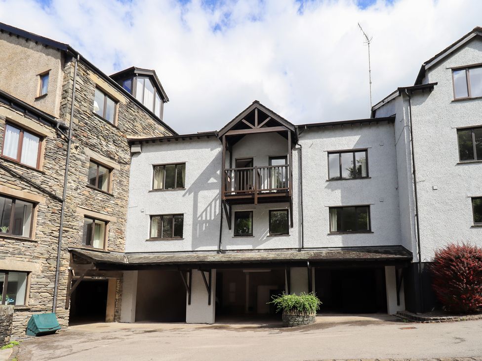 An exterior view of a building with a balcony at Ghyll Heights in Ambleside