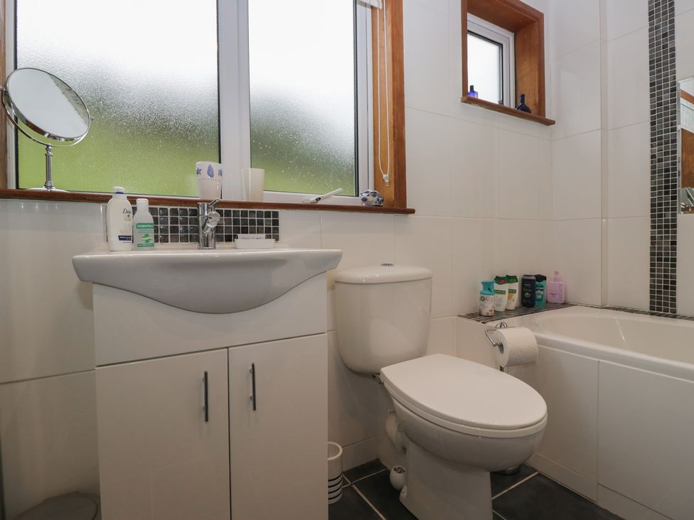 A bathroom with a sink and toilet at Redwood in Ambleside