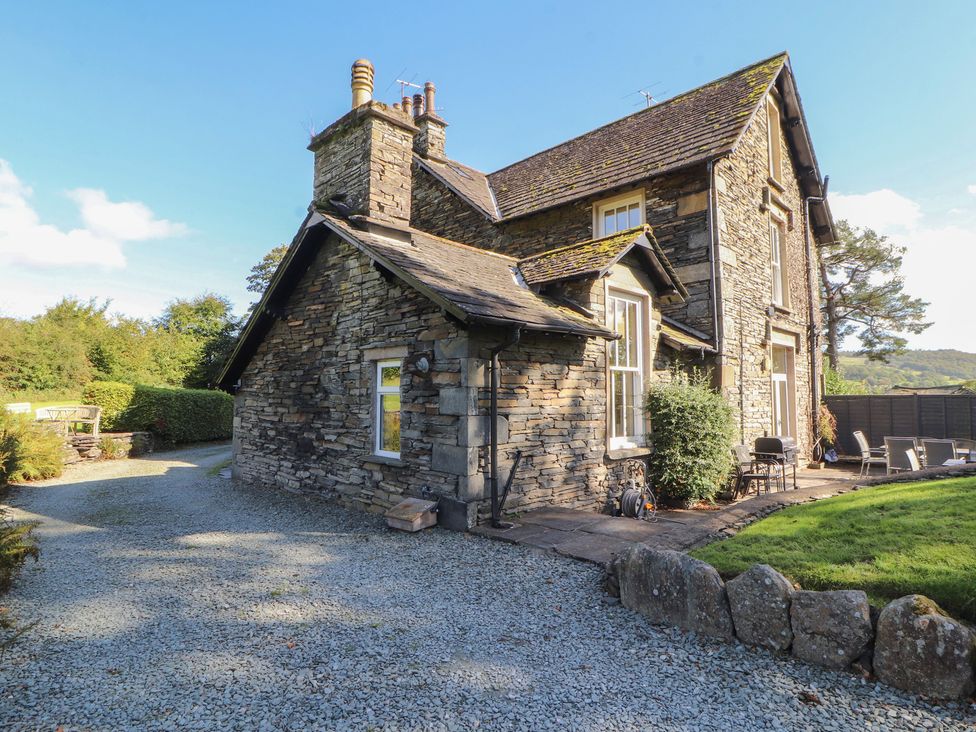 A house with stone wall and garden at Hawkshead Hall in Hawkshead
