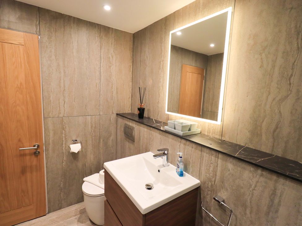 A bathroom with a sink and toilet at Gillybeck in Ambleside