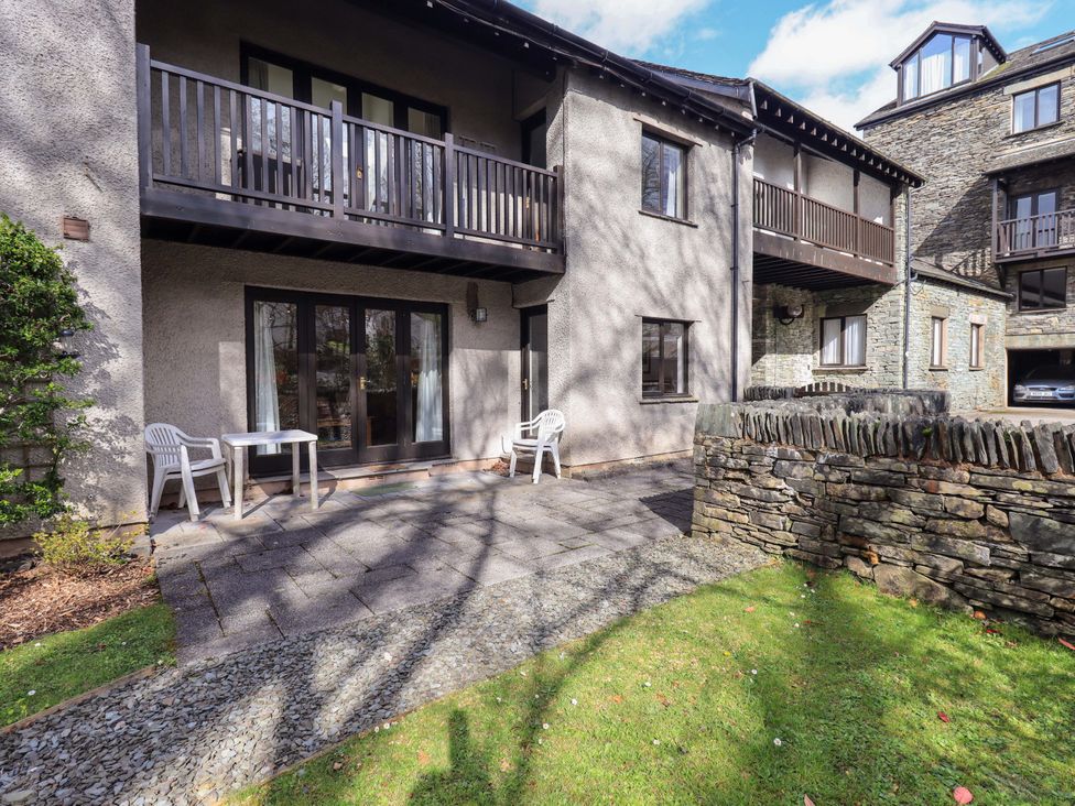 An outdoor area with a patio and balcony at Gillybeck in Ambleside