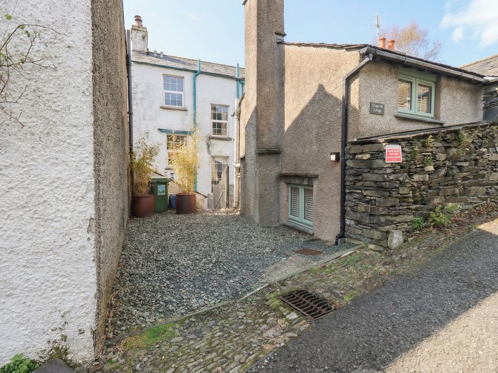 An alleyway between buildings at Chapel Hill Cottage in Ambleside