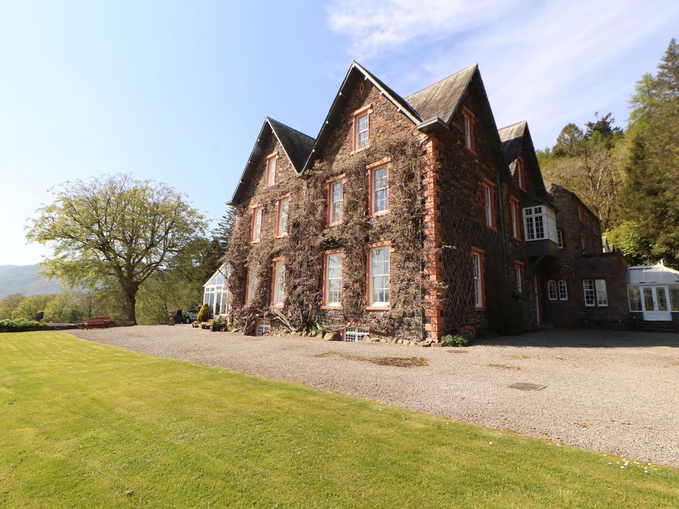 A house with a garden and trees at South View in Keswick
