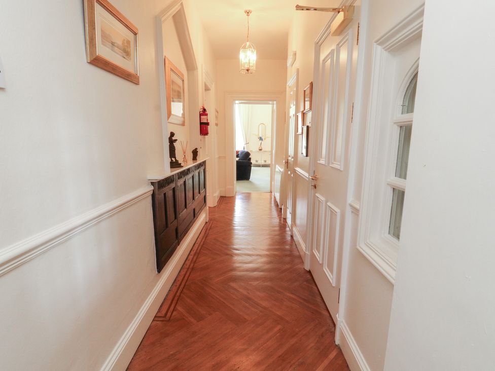 A hallway with doors and decorative items at South View in Keswick