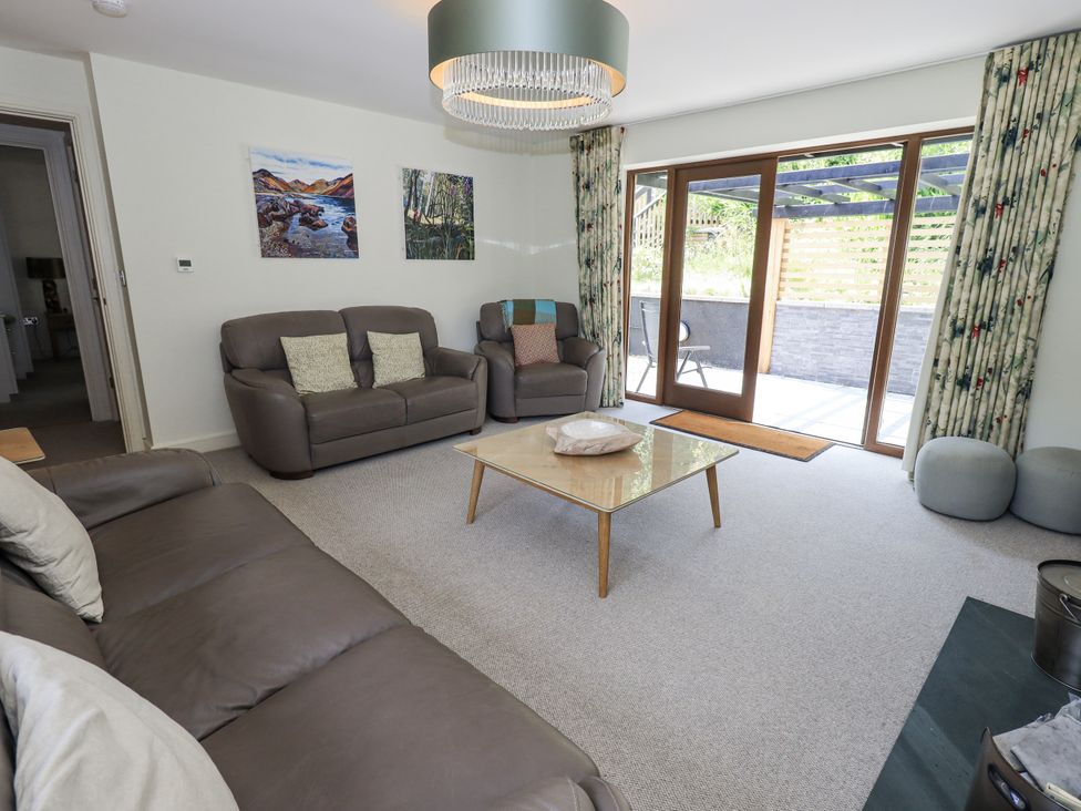 A living room with sofas and a coffee table at No 7 in Ambleside
