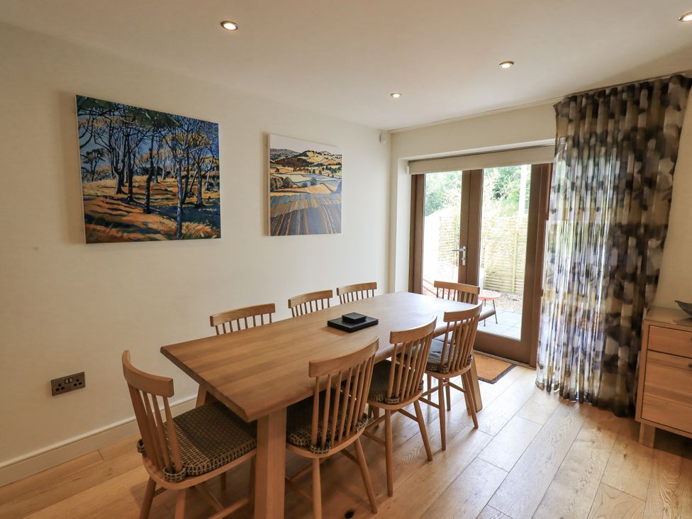 A dining room with a table and chairs at No 7 in Ambleside