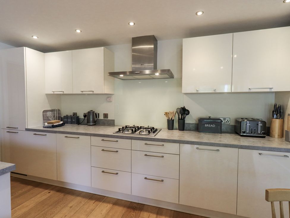 A kitchen with appliances and storage at No 7 in Ambleside