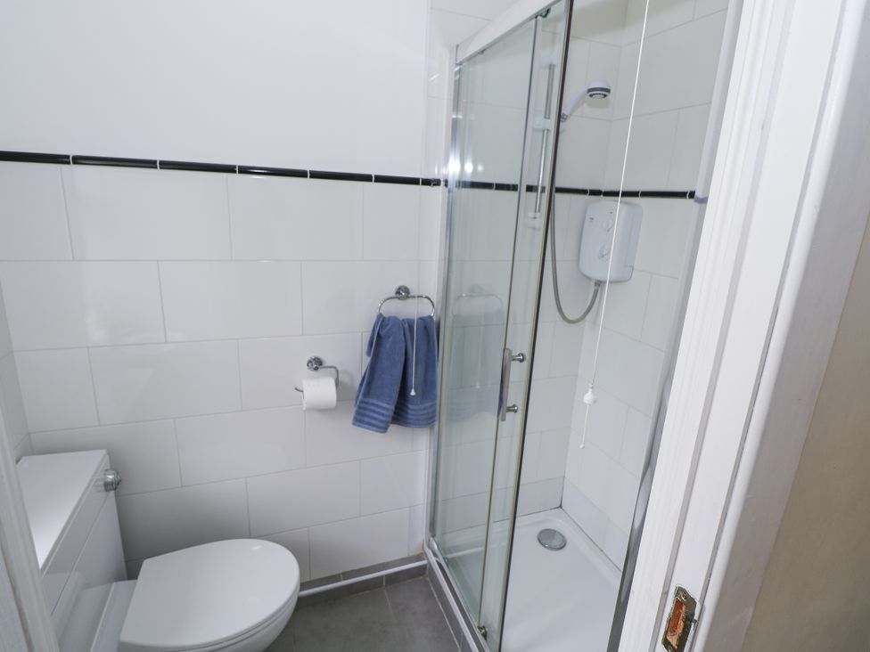 A bathroom with a shower and toilet at Brow O' The Hill in Ballyshannon