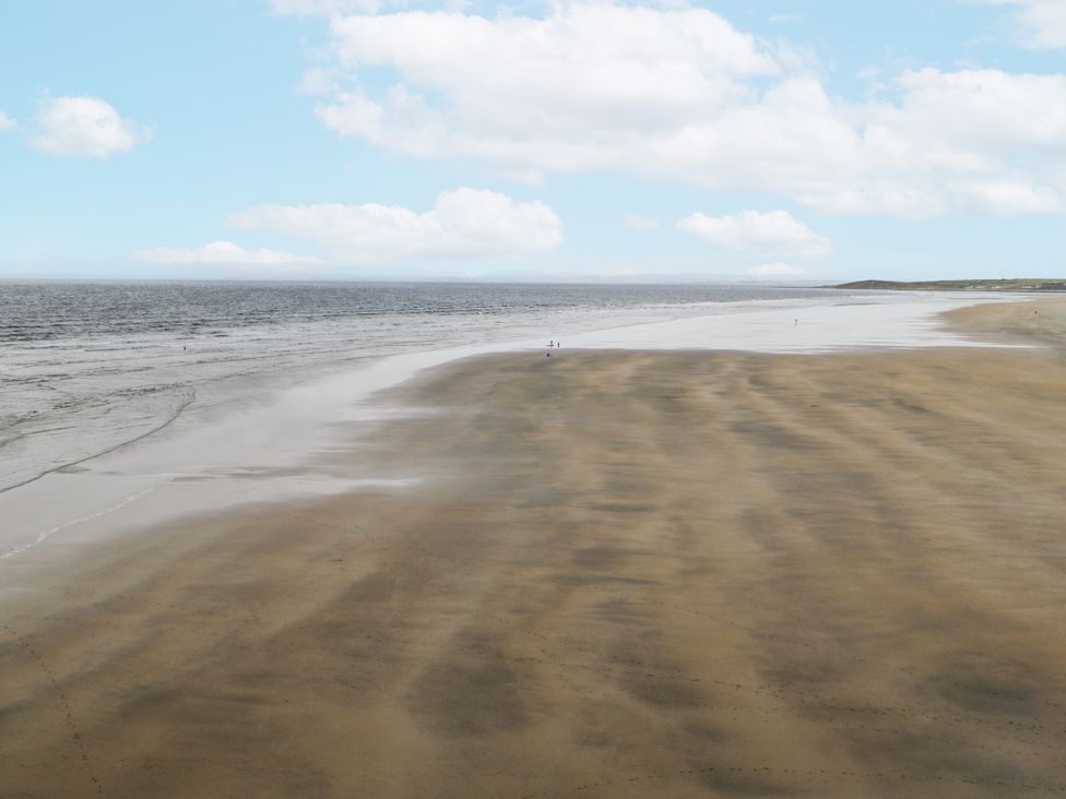 A beach with sand and water at Brow O' The Hill in Ballyshannon