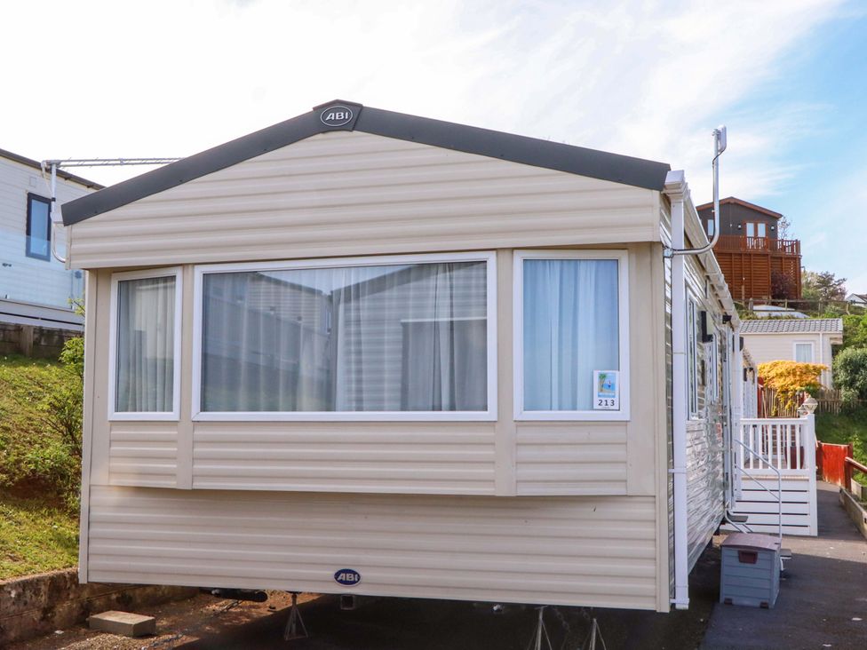 A caravan with windows and steps at 213 Seaview Caravan