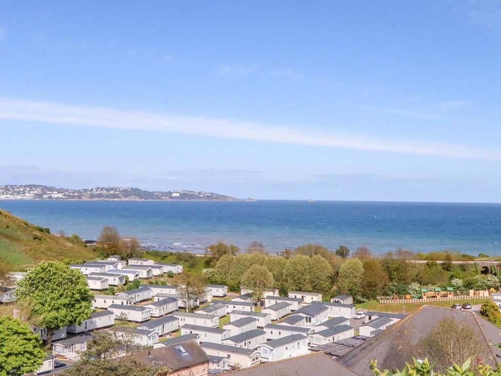 A view of caravans and the sea at 213 Seaview Caravan