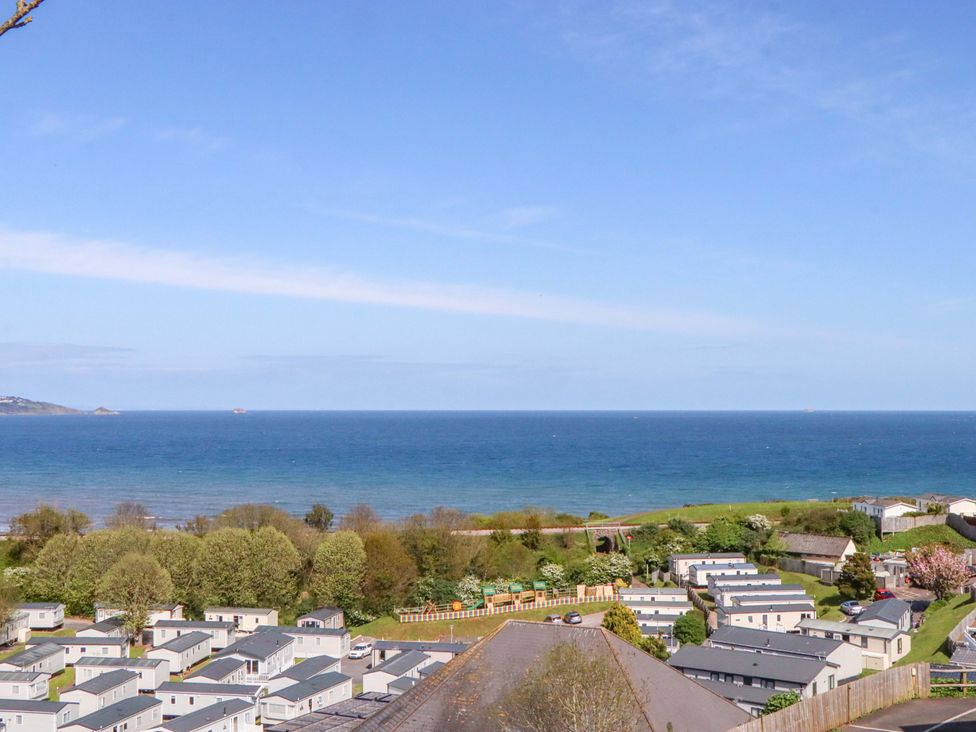 A scenic view of the sea and caravans at 213 Seaview Caravan