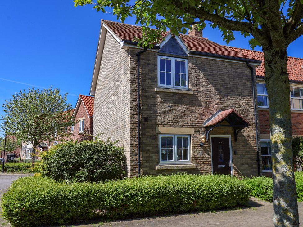 A house with windows and door at Driftwood in Filey