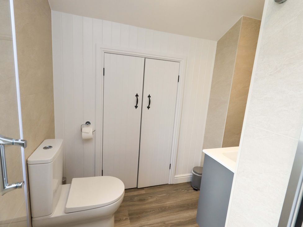 A bathroom with a toilet and sink at High Dow Crag in Coniston