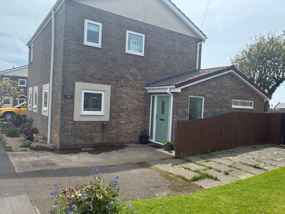 A house exterior with a garden at The Nest Beadnell