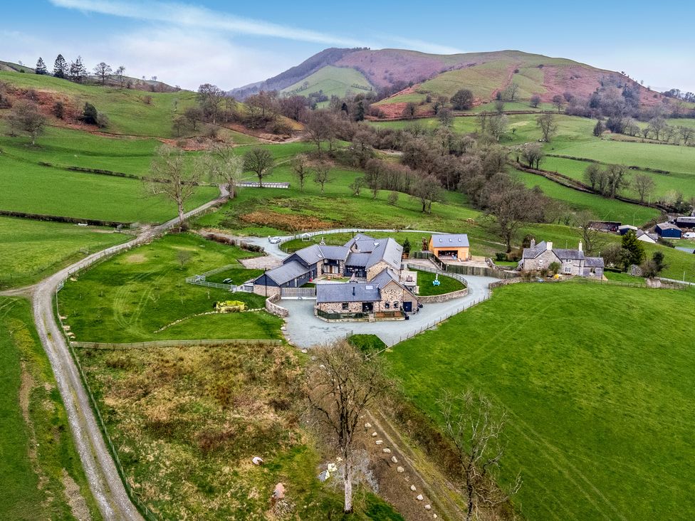 A view of a property with garden and fields at Y Granar (The Granary) Llanrhaeadr-Ym-Mochnant