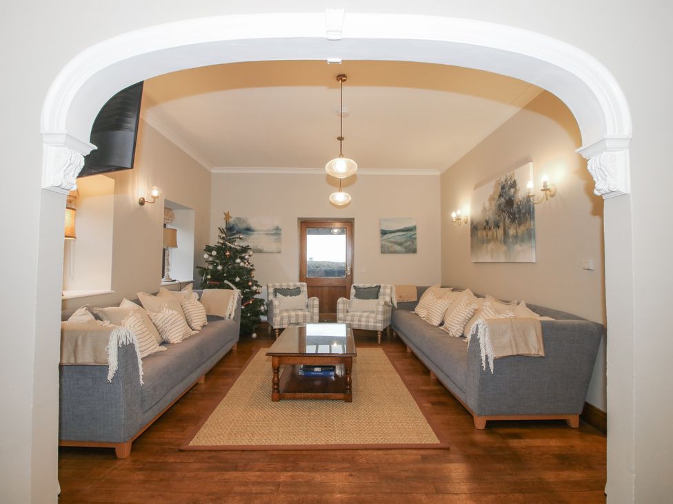 A living room with a coffee table and sofa at The Park in Ludlow