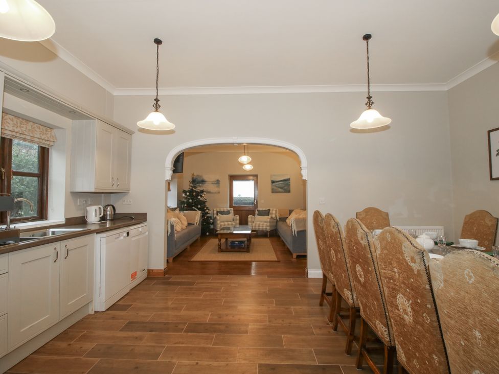 A kitchen with a dining table and chairs at The Park in Ludlow