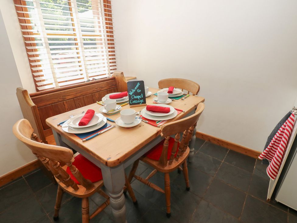 A dining room with table and chairs at Chapel Cottage Sandford, Cumbria