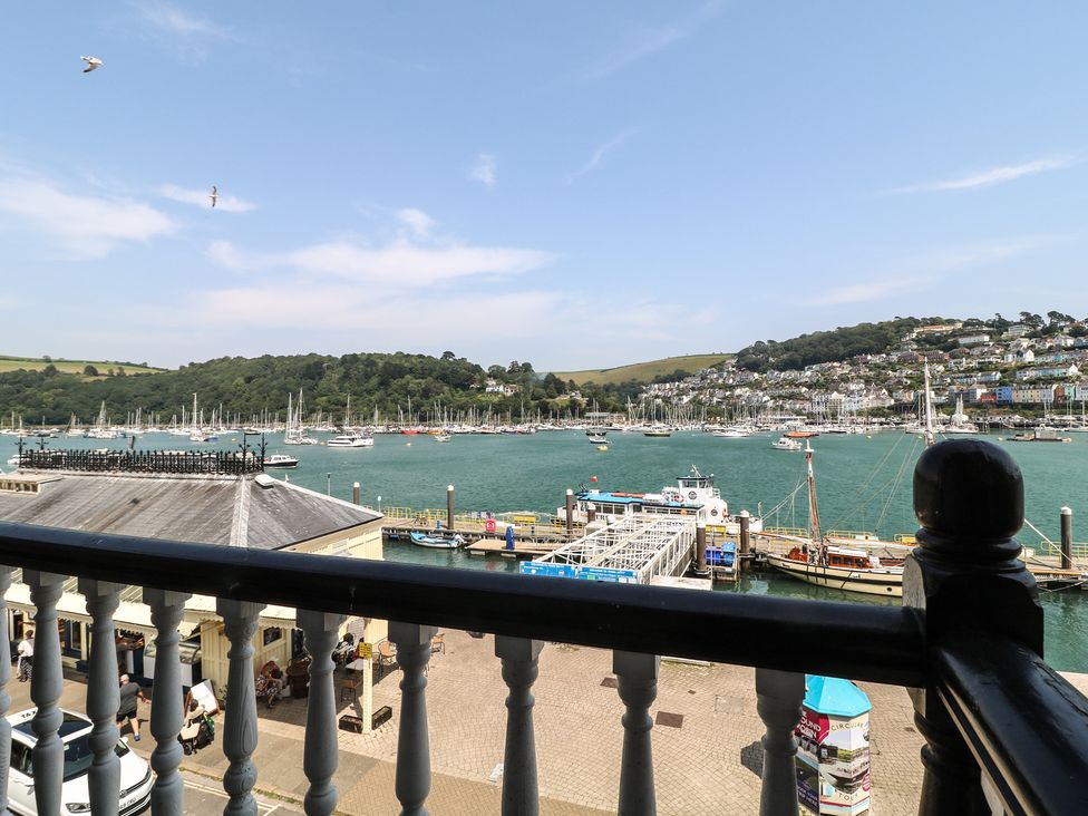 A view of boats in a harbor from a balcony at 2 York House in Dartmouth