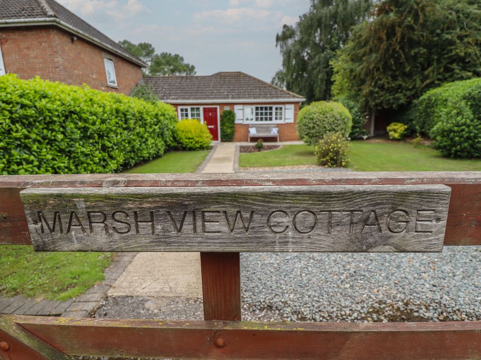 Exterior view of Marsh View Cottage with garden and pathway in Wainfleet All Saints