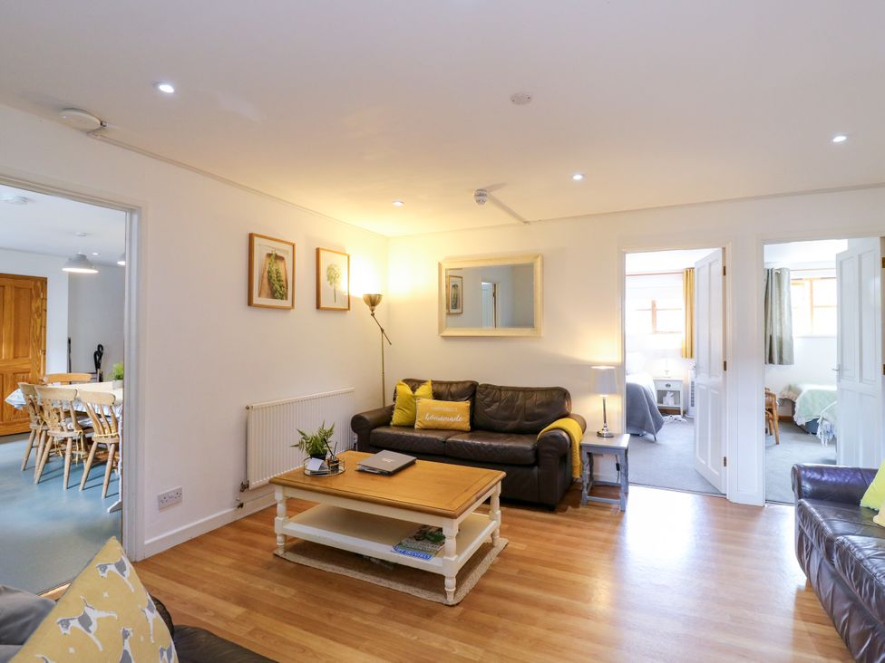 A living room with a sofa and coffee table at BB House in Roxhill Manor Farm
