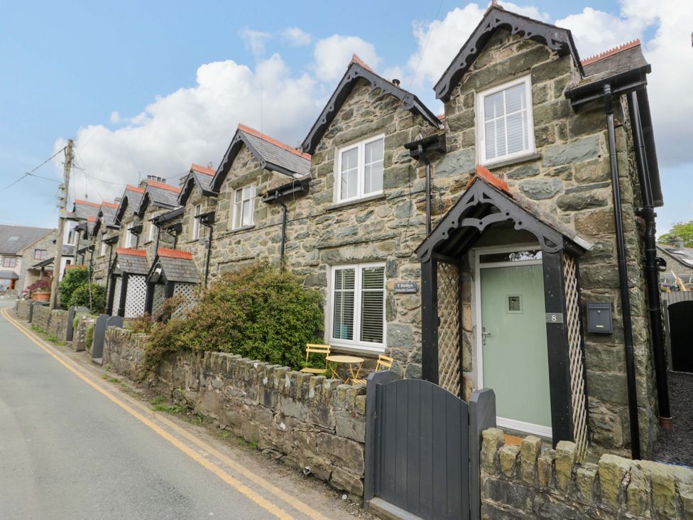 A row of stone houses along a road at Y Bwthyn Llanbedr
