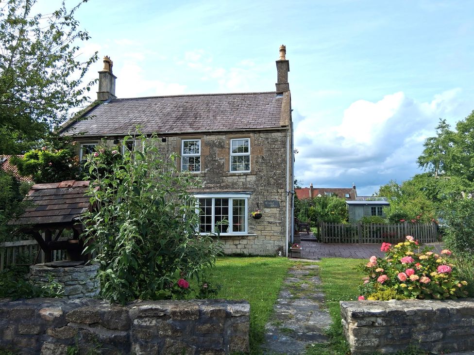 A house with a garden and path at Crooked Well Timsbury, Nr Bath